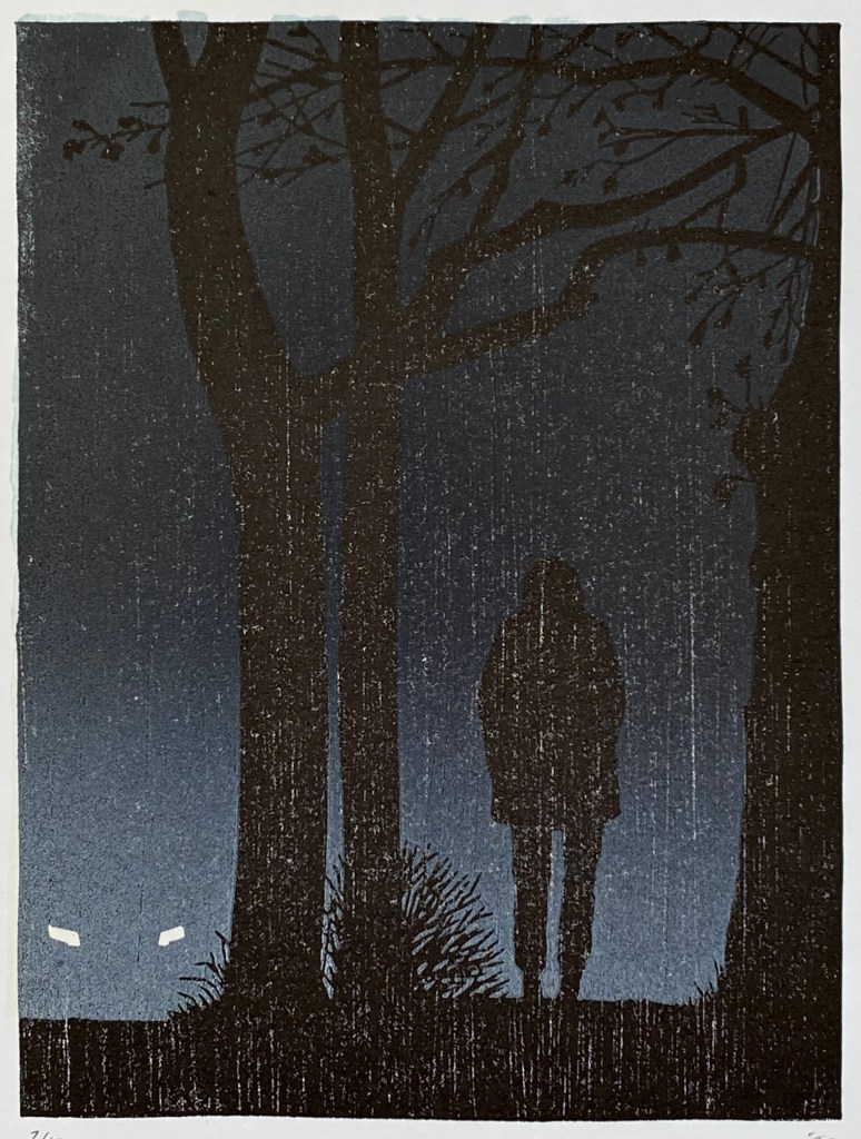 A walking figure between trees is silhouetted against the glow of approaching car headlights
